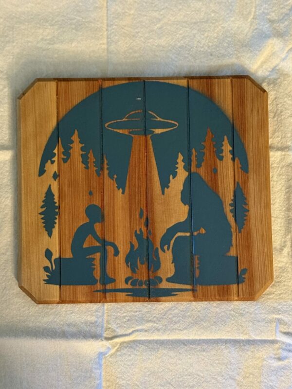 Bigfoot Meets Alien over a campfire